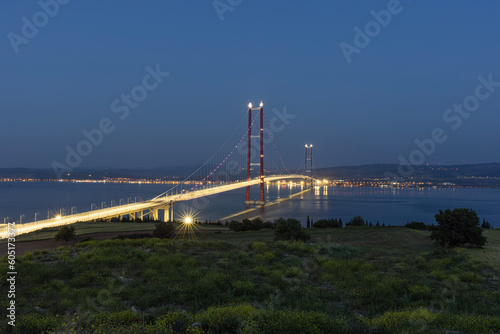 1915 Canakkale Bridge aerial view in Canakkale, Turkey. World's longest suspension bridge opened in Turkey. Turkish: 1915 Canakkale Koprusu. Bridge connect the Lapseki to the Gelibolu. photo