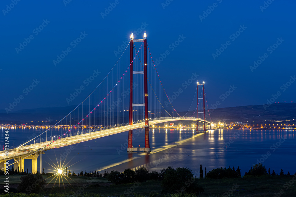 1915 Canakkale Bridge aerial view in Canakkale, Turkey. World's longest suspension bridge opened in Turkey. Turkish: 1915 Canakkale Koprusu. Bridge connect the Lapseki to the Gelibolu. 1915 Canakkale Bridge aerial view in Canakkale, Turkey. World's longest suspension bridge opened in Turkey. Turkish: 1915 Canakkale Koprusu. Bridge connect the Lapseki to the Gelibolu.
