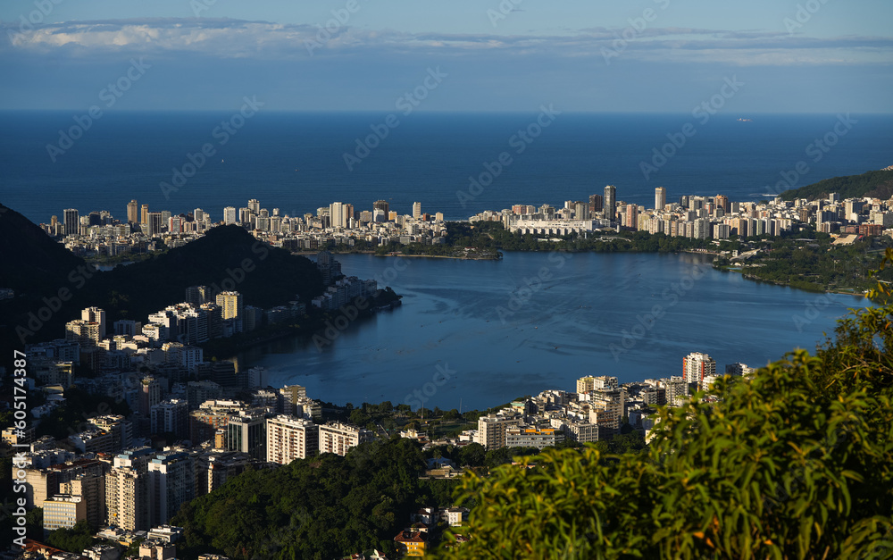 Rio de Janeiro from above during a beautiful summer morning. Aerial photo with the skyline of Rio city, view to Sugar Loaf landmark mountain. Travel to Brazil.
