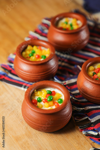 Moondi rabri milk kheer served in pot isolated on mat top view of indian, bangali and pakistani dessert mithai photo