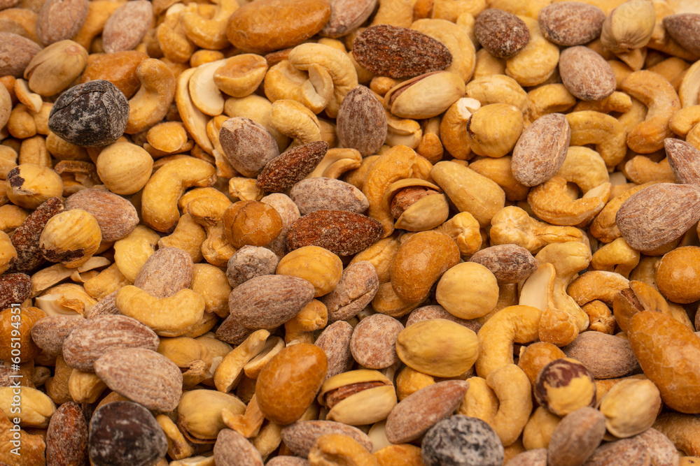 A group of almonds, pistachios, walnuts, macadamia, cashews. A group of almonds, pistachios, walnuts, macadamia, cashews.