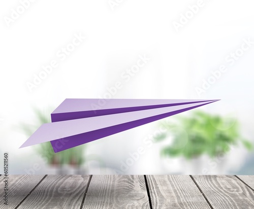 Purple colored paper plane on background
