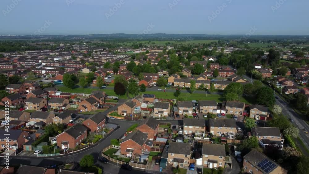 Aerial view flying over UK rural suburban village with high housing property interest rates Aerial view flying over UK rural suburban village with high housing property interest rates