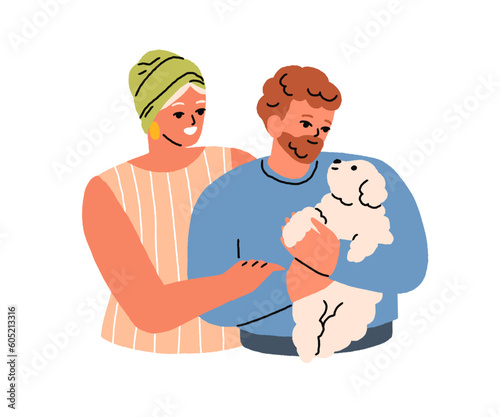 Happy family couple holding adopted puppy. Smiling man and woman with cute ad...