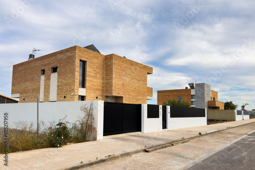 Villa under construction. Townhouse on Construction site. Luxury villa under construction near beach of Mediterranean sea. Construction of modern house near coastline. Home renovation near ocean. © MaxSafaniuk