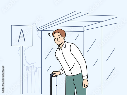 Confused man with suitcase waiting on bus stop for public transport. Frustrated male traveler expect for taxi or tram outdoors. Vector illustration. 