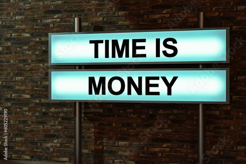 Time is money. Black letters on a light box in front of a red brick wall. Making money, investment, business, savings, fast, stock market and exchange. 3D illustration photo