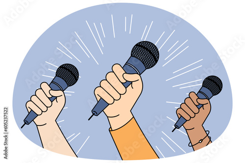Diverse people with microphones go for freedom of speech