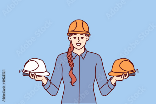 Woman foreman of construction company holds protective helmets for workers urging them to observe safety precautions in workplace. Girl with protective helmets for being in factory or plant