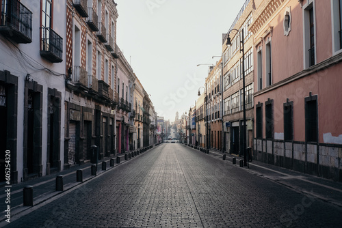 empty colonial narrow street in the town of puebla, mexico