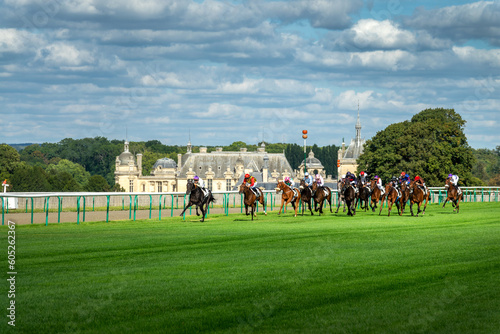 Horse race near the castle of Chantilly, France. photo