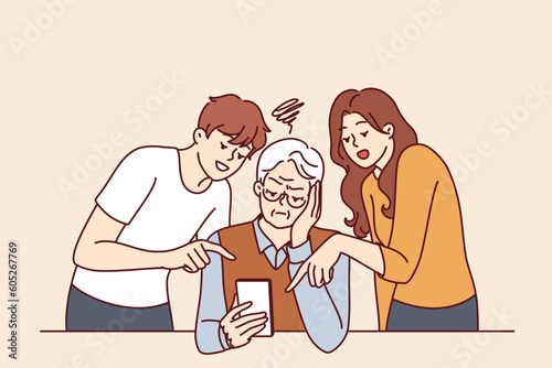 Elderly man learns to use phone and listens to advice of adult children teaching how to send SMS message. Old human is upset because of inability to use modern smartphone and online app