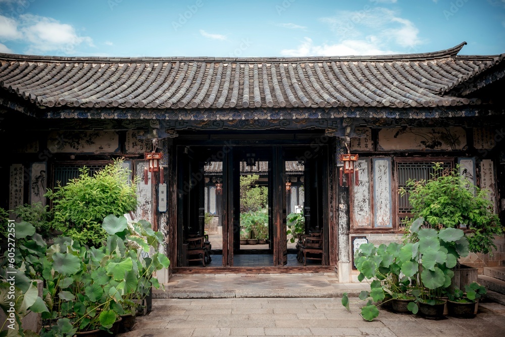 Facade of an old traditional Chinese house in the Zhu family garden in Jianshui, China. Facade of an old traditional Chinese house in the Zhu family garden in Jianshui, China.