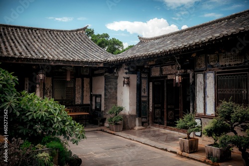 Facade of an old traditional Chinese house in the Zhu family garden in Jianshui, China.