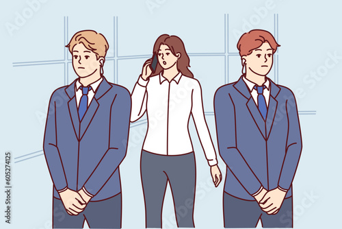 Two bodyguards near businesswoman talking on phone and needing protection due to personal threats. Bodyguards in suit protect celebrity girl or politician making call on smartphone
