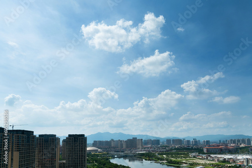 Seaside city under cloudy sky