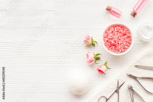 Manicure accessories with roses and towel. Beauty care salon spa.