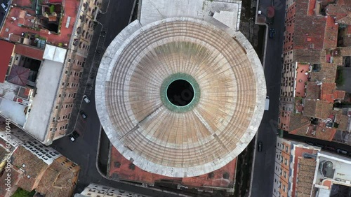 Aerial view of the Pantheon dome, famous monument in Rome, Italy. Former Roman temple, now Catholic church in Roma, Italia seen from drone flying in sky. Building, tourist destination of Italian city