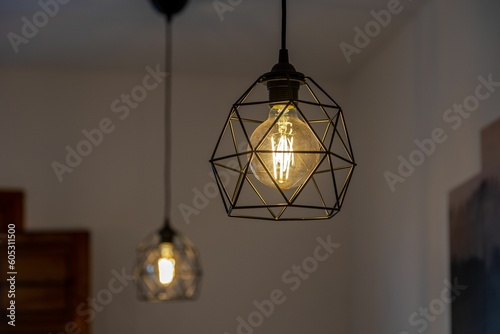 Black pendant lamp shade hanging on the ceiling
