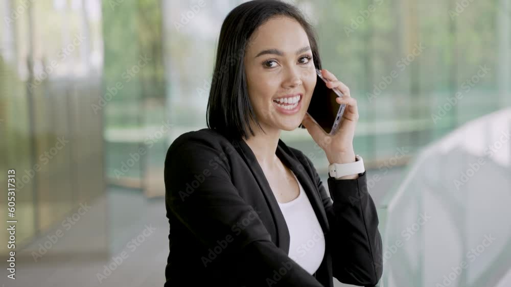 Smiling Thai Businesswoman Chatting Outside Smiling Thai Businesswoman Chatting Outside