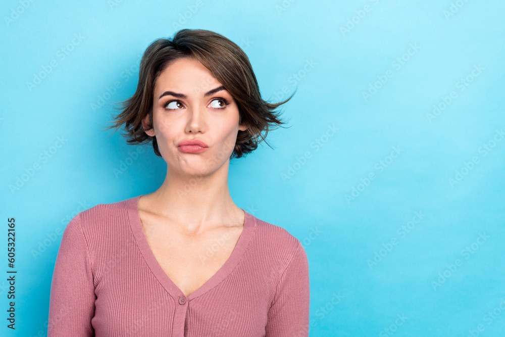 Photo of negative unhappy lady look up empty space dislike unpleasant situation wear pink shirt isolated blue color background Photo of negative unhappy lady look up empty space dislike unpleasant situation wear pink shirt isolated blue color background