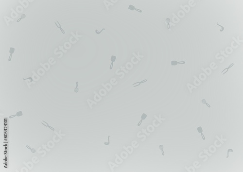 Grey background with kitchen utensils 
