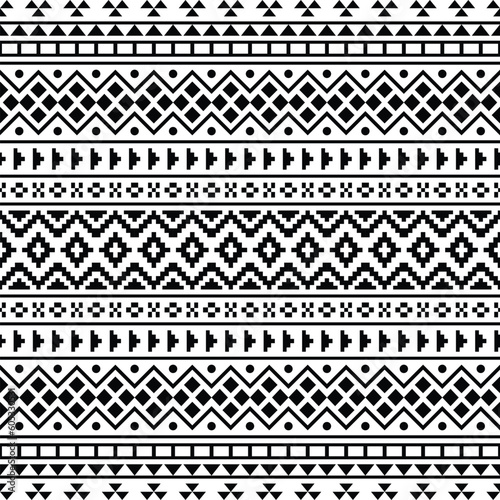 Geometric ornament design with seamless ethnic pattern. Tribal Aztec Navajo style. Black and white colors. Design for textile, fabric, clothing, curtain, rug, batik, ornament, background, wrapping.