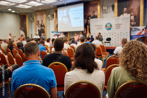 Speaker at Business Conference and Presentation. Audience at the conference hall. photo