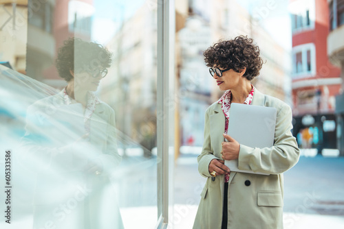 фотографія Beautiful business professional woman in the city outdoor