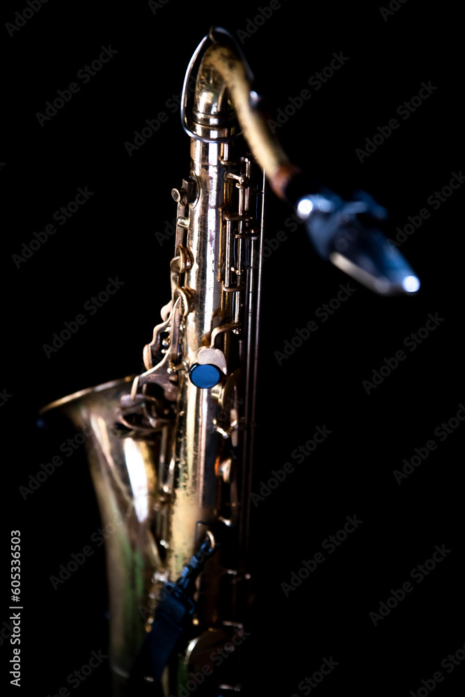 Fototapeta premium saxophone on a black