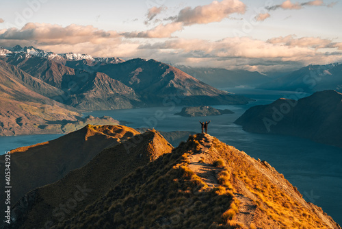 Roys peak beautiful mountain landscape background. Lake Wanaka New Zealand. Top view mountains overlooking scenic view of alpine landscape. Hiking in New Zealand. Popular tourism and travel location photo