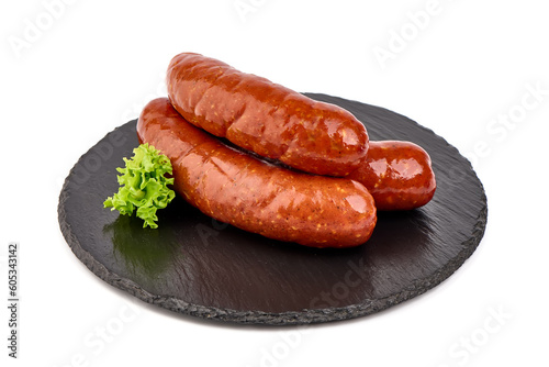 Smoked bratwurst sausages, isolated on white background.