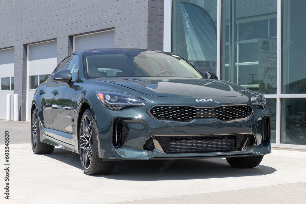 Kia Stinger Sports Sedan display at a dealership. Kia offers the