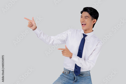 Portrait young asian business man pointing and presenting isolated on white background, advertising and marketing, executive and manager, businessman confident showing something with expression.