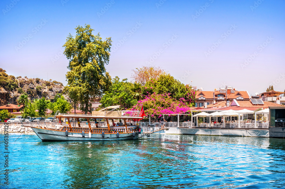 Pleasure boats on the river and a restaurant, Dalyan River, Lycian Tombs, Mediterranean Sea, Marmaris, Turkey