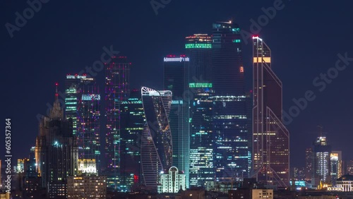 Stalin skyskrapers night timelapse, Moscow International Business Center towers and panoramic top close up view of Moscow. Rooftop view with night illumination photo
