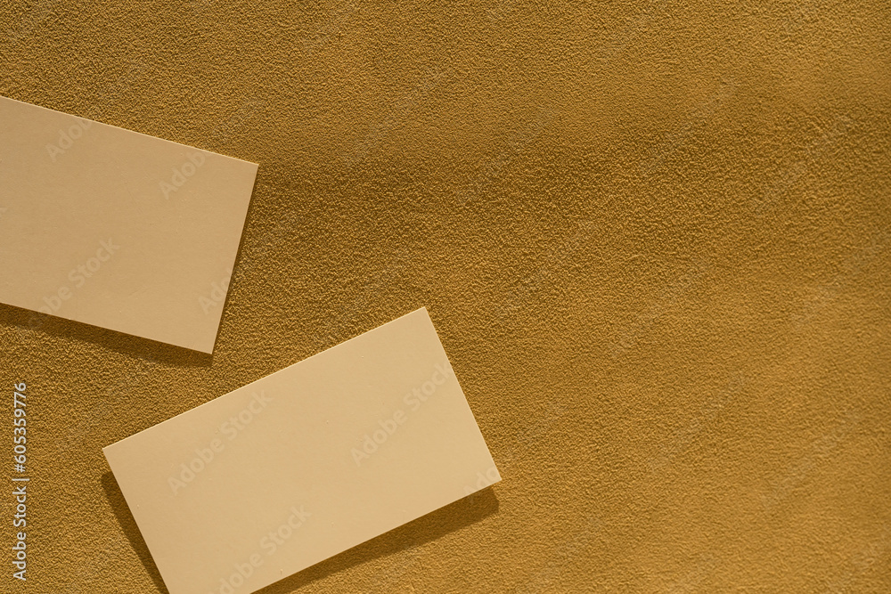 Blank paper card sheets on tan beige background. Social media, web branding template with copy space, clipping path Blank paper card sheets on tan beige background. Social media, web branding template with copy space, clipping path