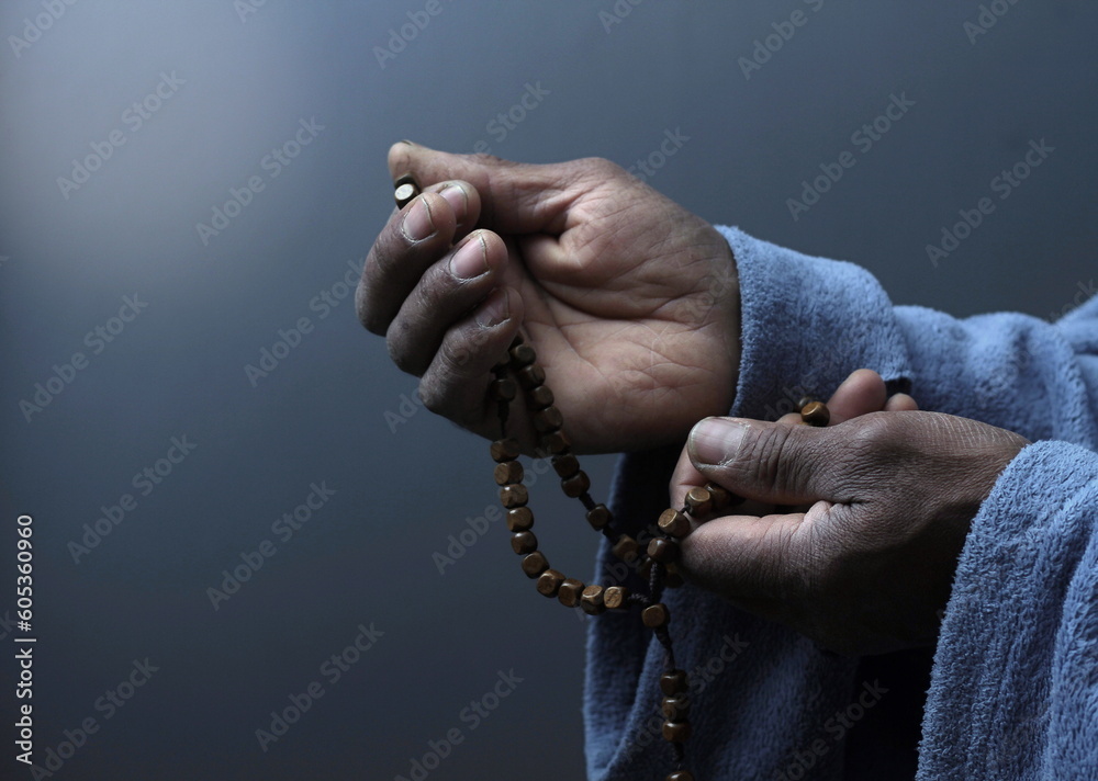 praying to god with hands together with people stock photo