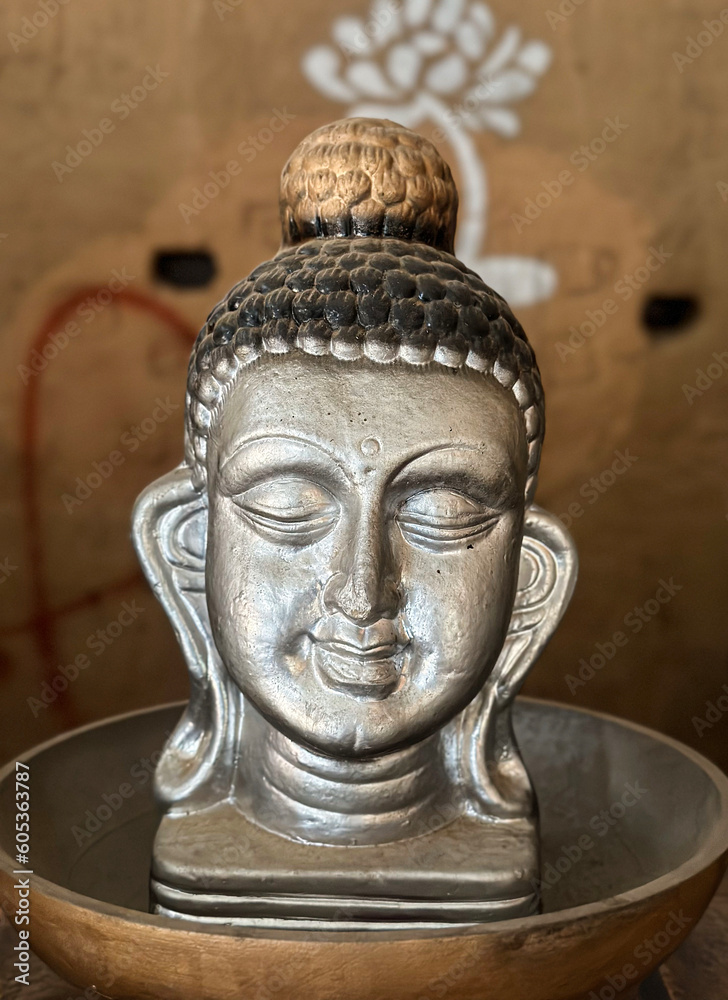 antique statue of buddha's face