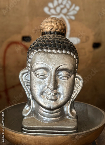 antique statue of buddha's face