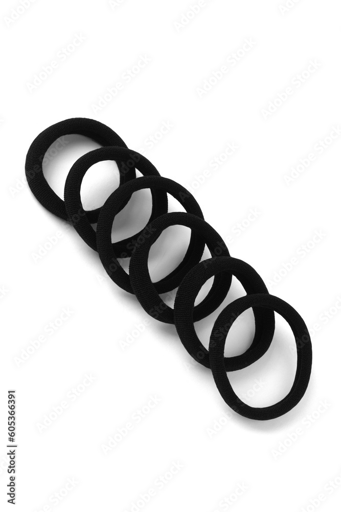 Subject shot of black scrunchies. The set consists of six rubber band. The vogue accessories are isolated on the white background. Subject shot of black scrunchies. The set consists of six rubber band. The vogue accessories are isolated on the white background.