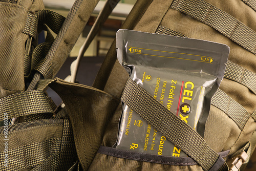 hemostatic military bandage Cellox in the side pocket of a military tactical backpack with the Molle system