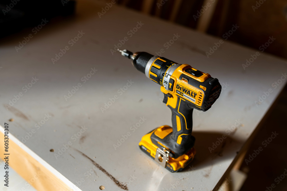 Miercurea Ciuc Romania May 23 2023 Dewalt DCD795D2 18 volt brusheless compact lithium ion combi drill in a small woodworking shop. Stock Photo Adobe Stock