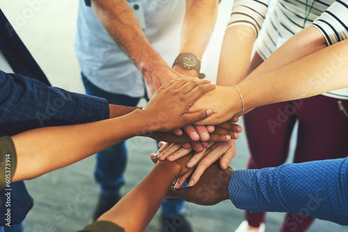 Photos Team trust, hands together and motivation of staff with collaboration, support and community