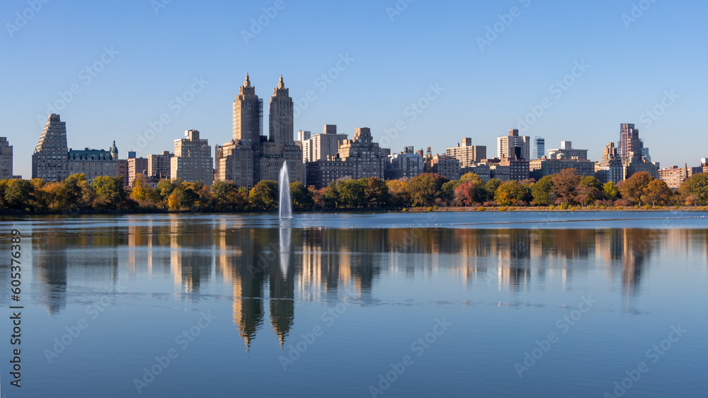 Central Park lake in New York with reflection during sunny autumn day