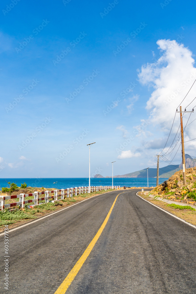 Fototapeta premium View of ocean road in Nhat beach, Con Dao island, Vietnam. Beautiful and tranquil, it is a proud destination worth exploring in Vietnam.