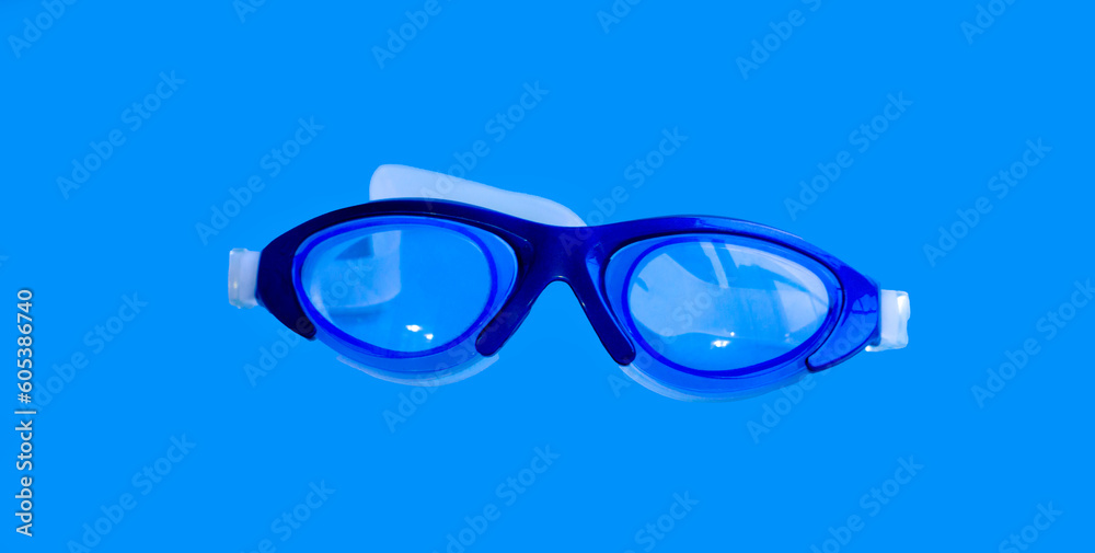 Swimming goggles sport summer on a blue background