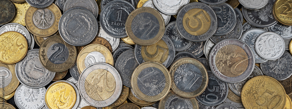 A pile of gold and silver coins. A pile of gold and silver coins.