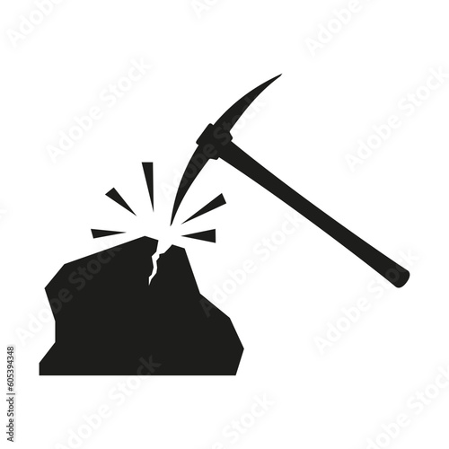 Hammer pick and cracked stone vector icon black silhouette. The concept of mining.