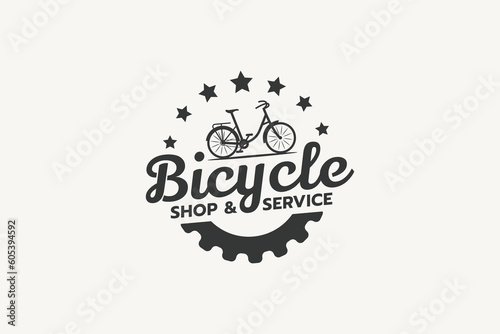 bicycle shop and service logo with a combination of bicycle, gear and vintage style.